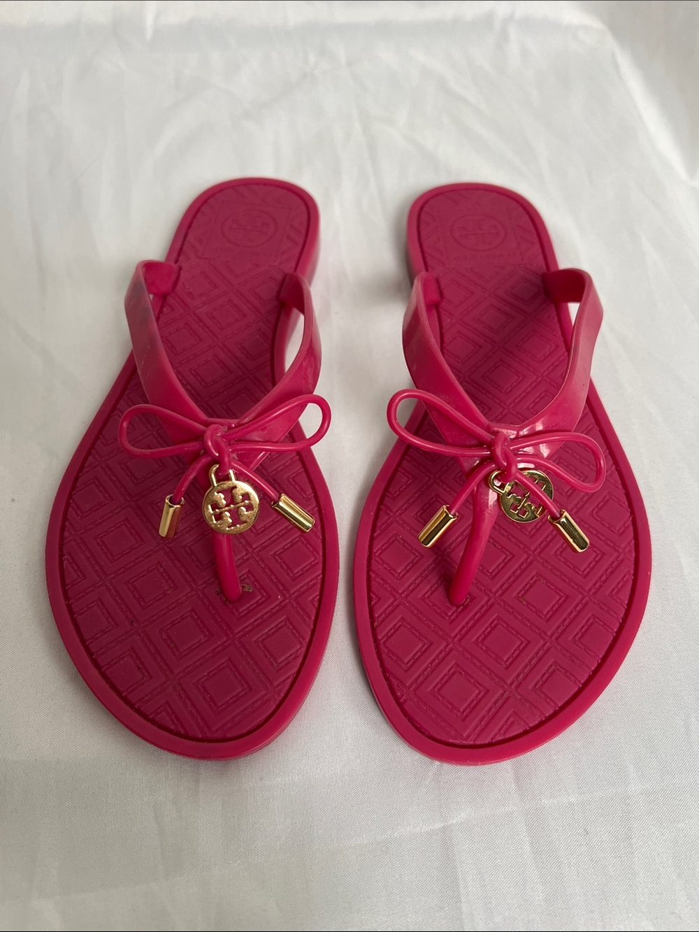 Tory Burch Hot Pink Bow Jelly Thong Sandals with Gold Logo